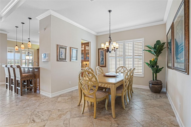 dining area featuring a notable chandelier and ornamental molding