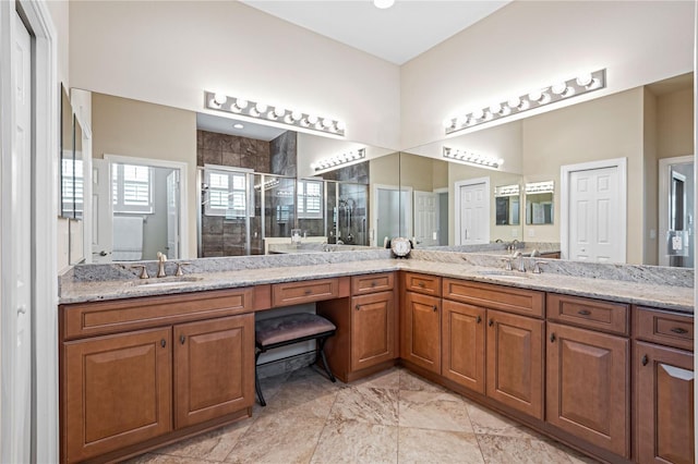 bathroom with vanity and walk in shower