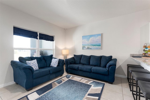 living room with light tile patterned floors