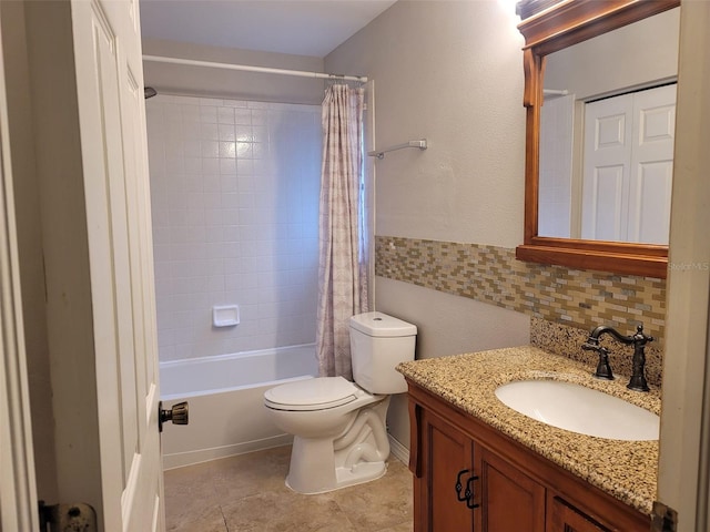 full bathroom with vanity, toilet, tile patterned floors, shower / tub combo with curtain, and decorative backsplash