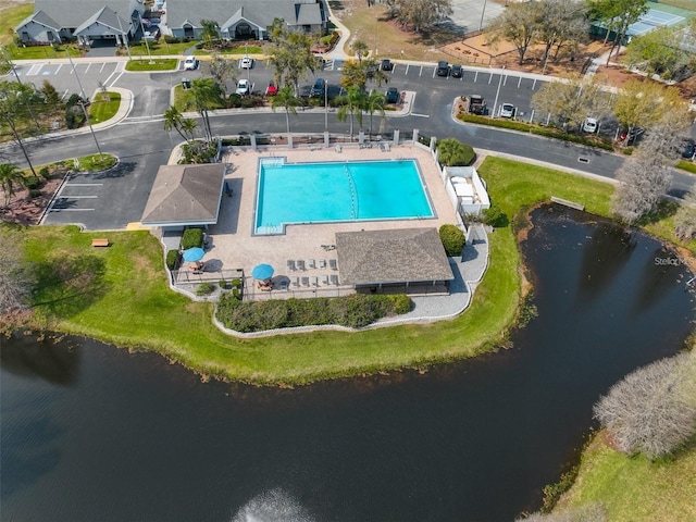 birds eye view of property featuring a water view