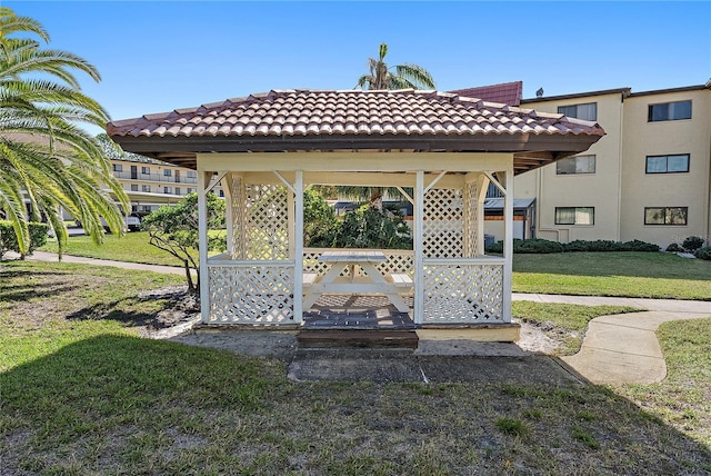 exterior space featuring a gazebo and a lawn