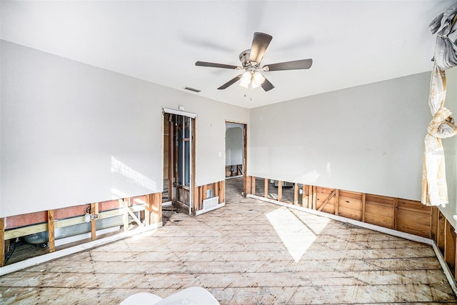 unfurnished room featuring ceiling fan