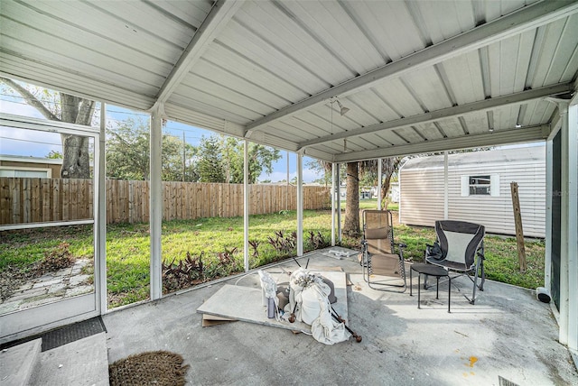 unfurnished sunroom with a wealth of natural light