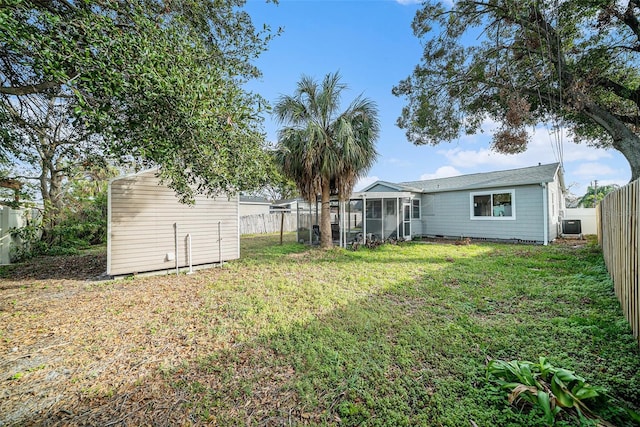 view of yard featuring a sunroom