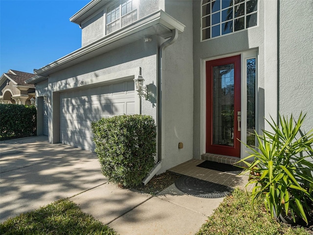 property entrance featuring a garage