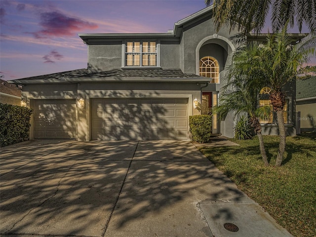 view of front of house with a garage