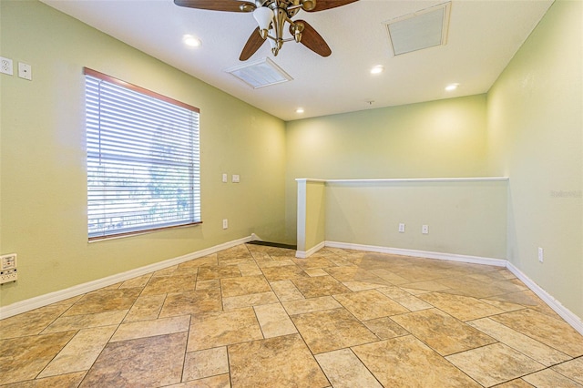 spare room featuring ceiling fan