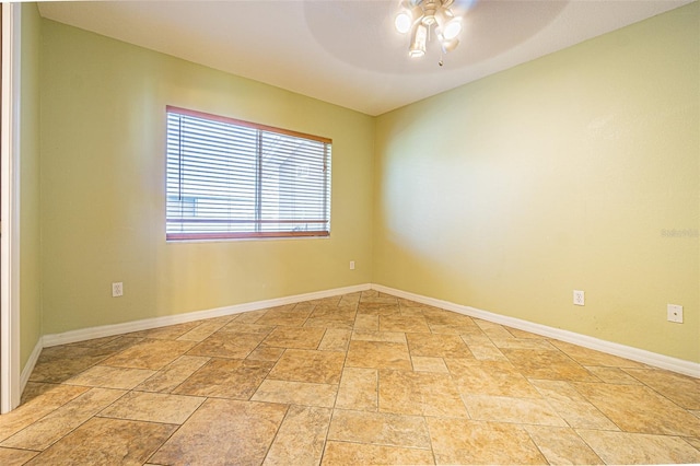 empty room featuring ceiling fan