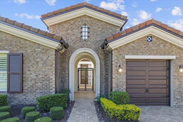 doorway to property featuring a garage