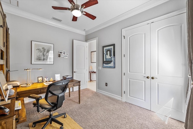 office featuring light colored carpet, ceiling fan, and crown molding