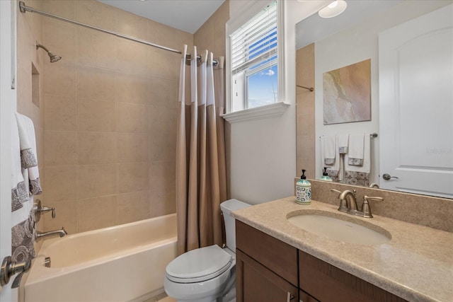 full bathroom featuring shower / bath combination with curtain, toilet, and vanity