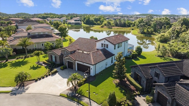 drone / aerial view featuring a water view