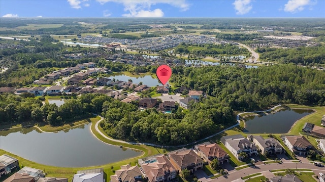 bird's eye view with a water view