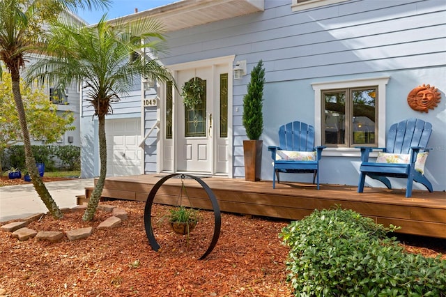 entrance to property with a deck