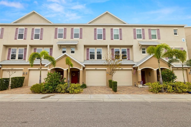 view of property featuring a garage