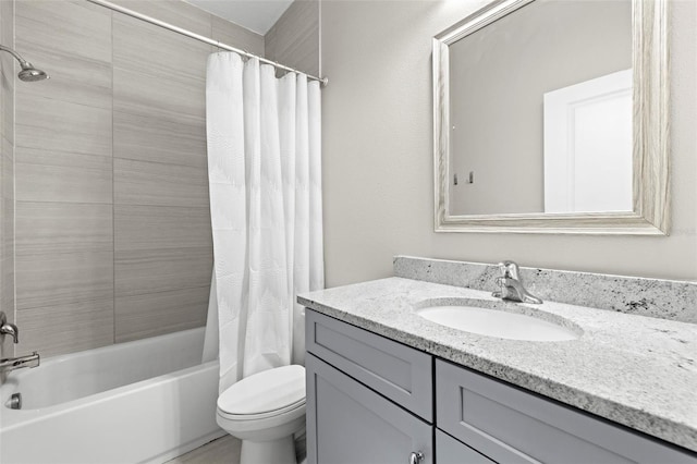 full bathroom with vanity, toilet, and shower / bathtub combination with curtain