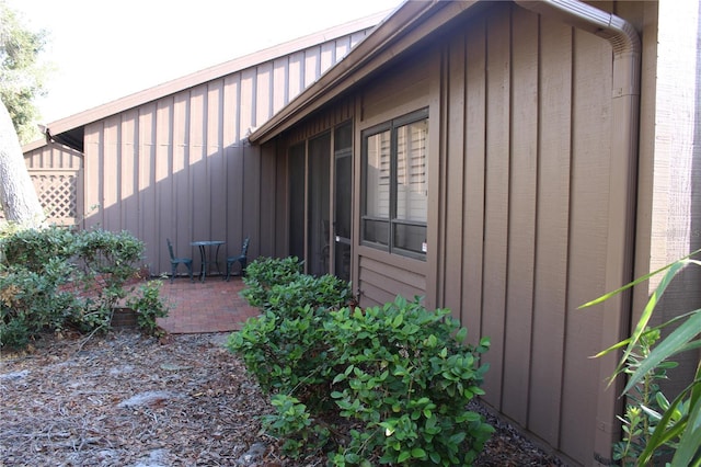 view of property exterior with a patio