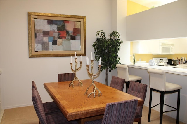 view of carpeted dining room