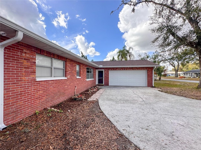 single story home with a garage