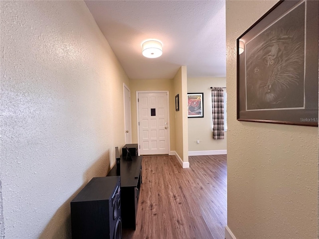 hallway featuring hardwood / wood-style floors