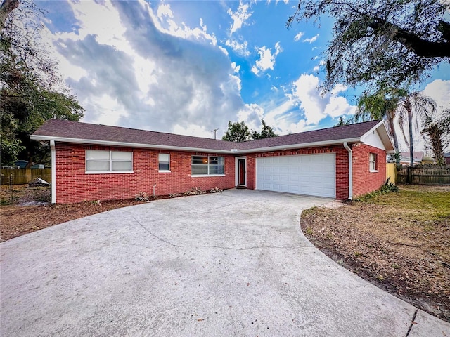 single story home featuring a garage