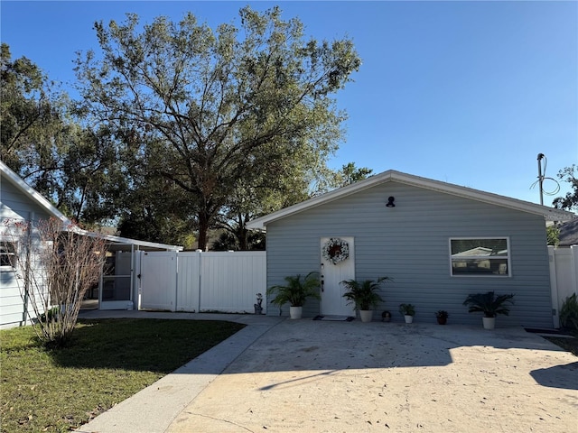 view of property exterior featuring a yard