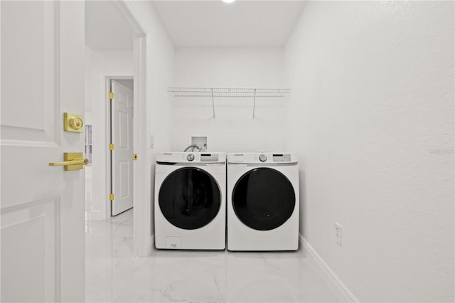 laundry area featuring washer and clothes dryer