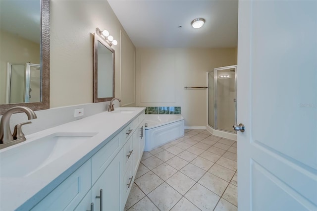 bathroom featuring vanity, tile patterned flooring, and independent shower and bath