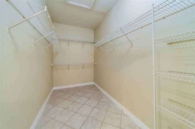 walk in closet featuring tile patterned floors