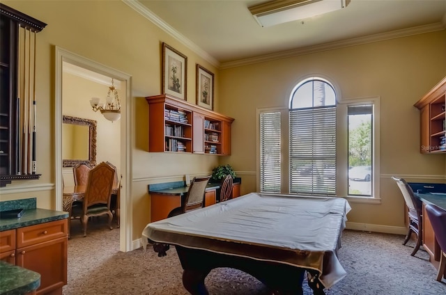 recreation room with billiards, ornamental molding, plenty of natural light, and light colored carpet