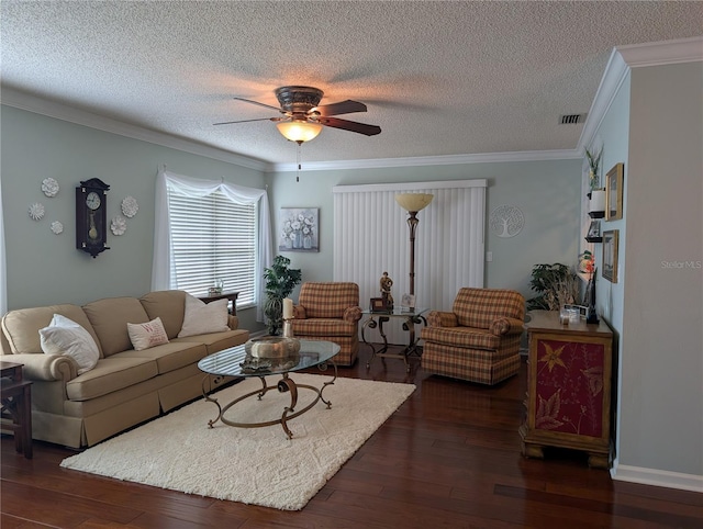 living room with dark hardwood / wood-style flooring, a textured ceiling, ceiling fan, and crown molding