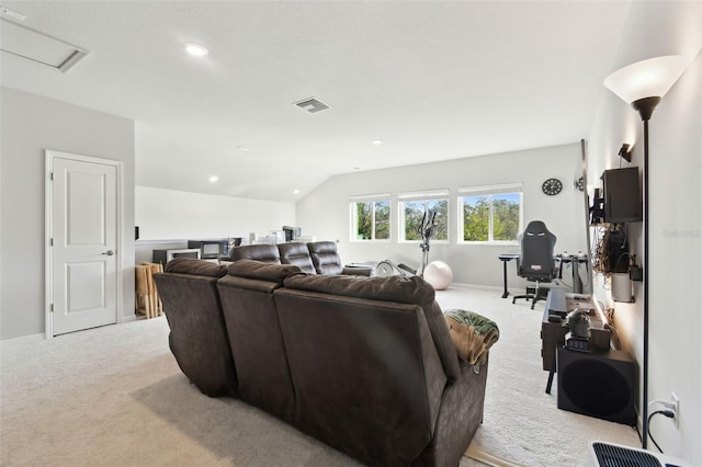 carpeted living room with lofted ceiling