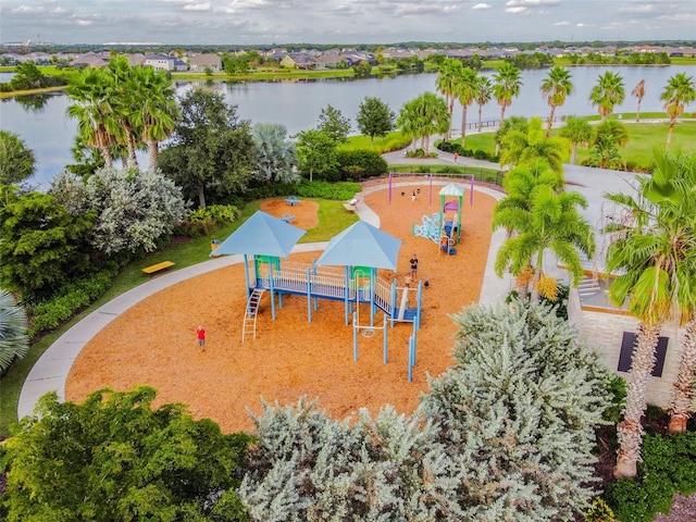 birds eye view of property featuring a water view