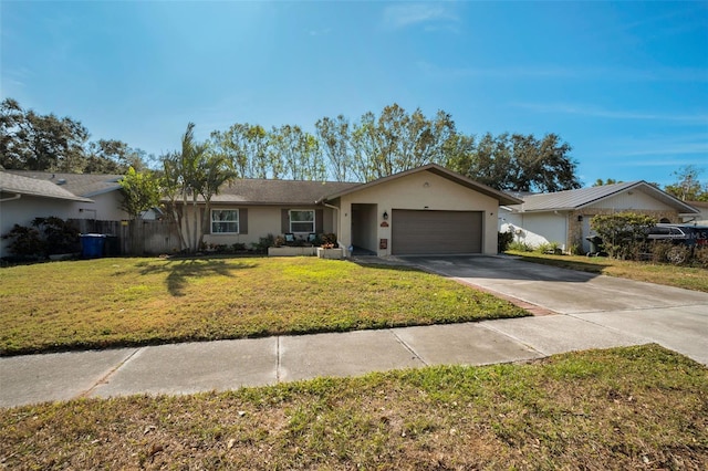 ranch-style house with a garage and a front lawn