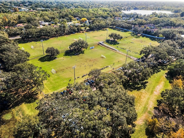 birds eye view of property with a rural view and a water view