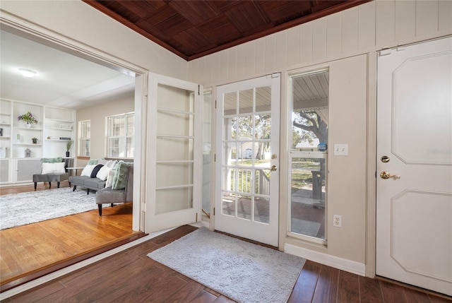 entryway featuring built in shelves, wood-type flooring, and wooden ceiling