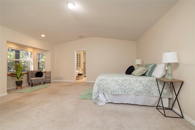 bedroom featuring lofted ceiling, visible vents, light carpet, and baseboards