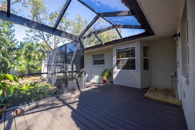 deck featuring glass enclosure