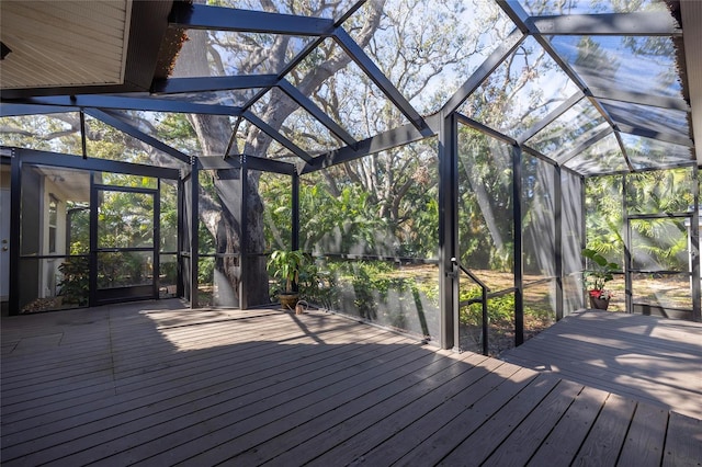 wooden deck featuring a lanai