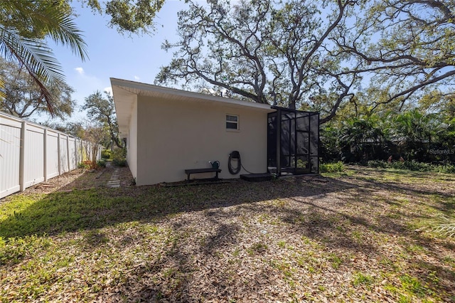 exterior space with fence