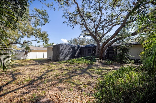 view of yard featuring fence