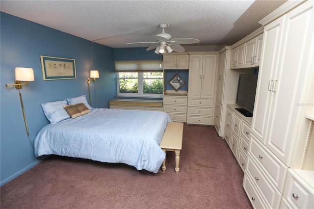 carpeted bedroom featuring ceiling fan and a textured ceiling