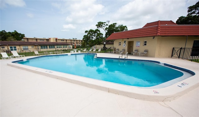 view of pool with a patio