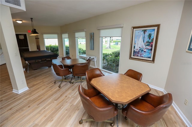 dining room with light wood-type flooring