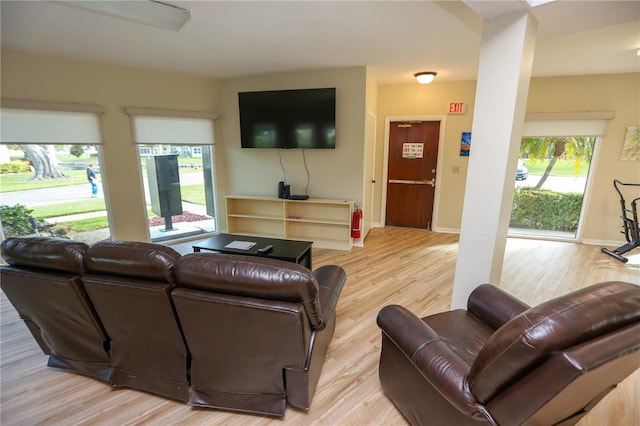 living room with light hardwood / wood-style floors