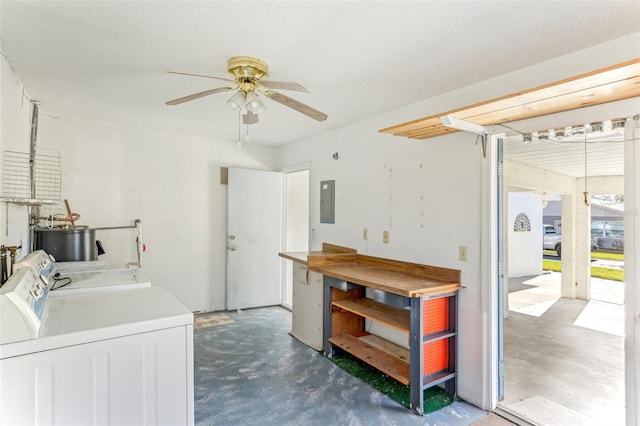 clothes washing area featuring independent washer and dryer, electric water heater, electric panel, and ceiling fan