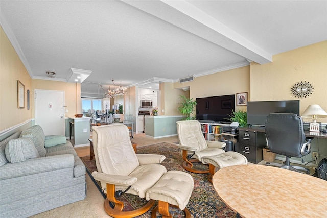 carpeted living room with ornamental molding, a textured ceiling, and a chandelier