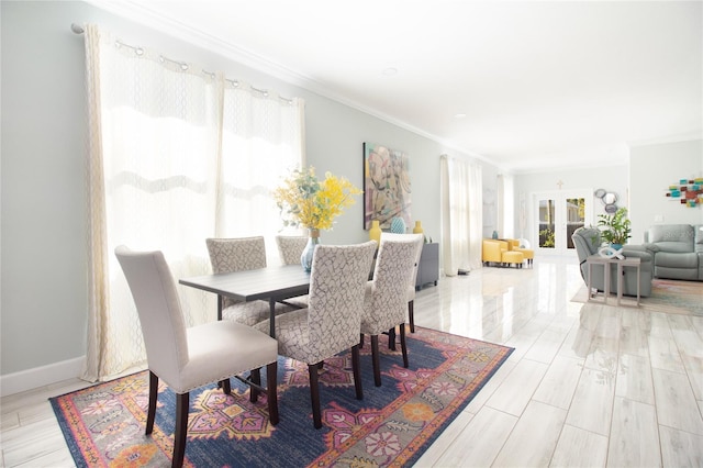 dining area featuring ornamental molding