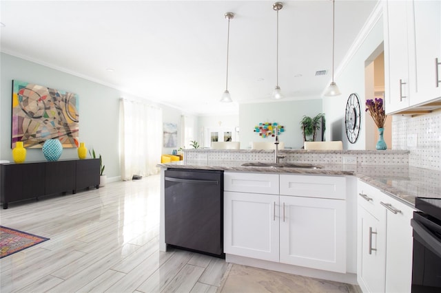 kitchen with white cabinets, black dishwasher, hanging light fixtures, and sink